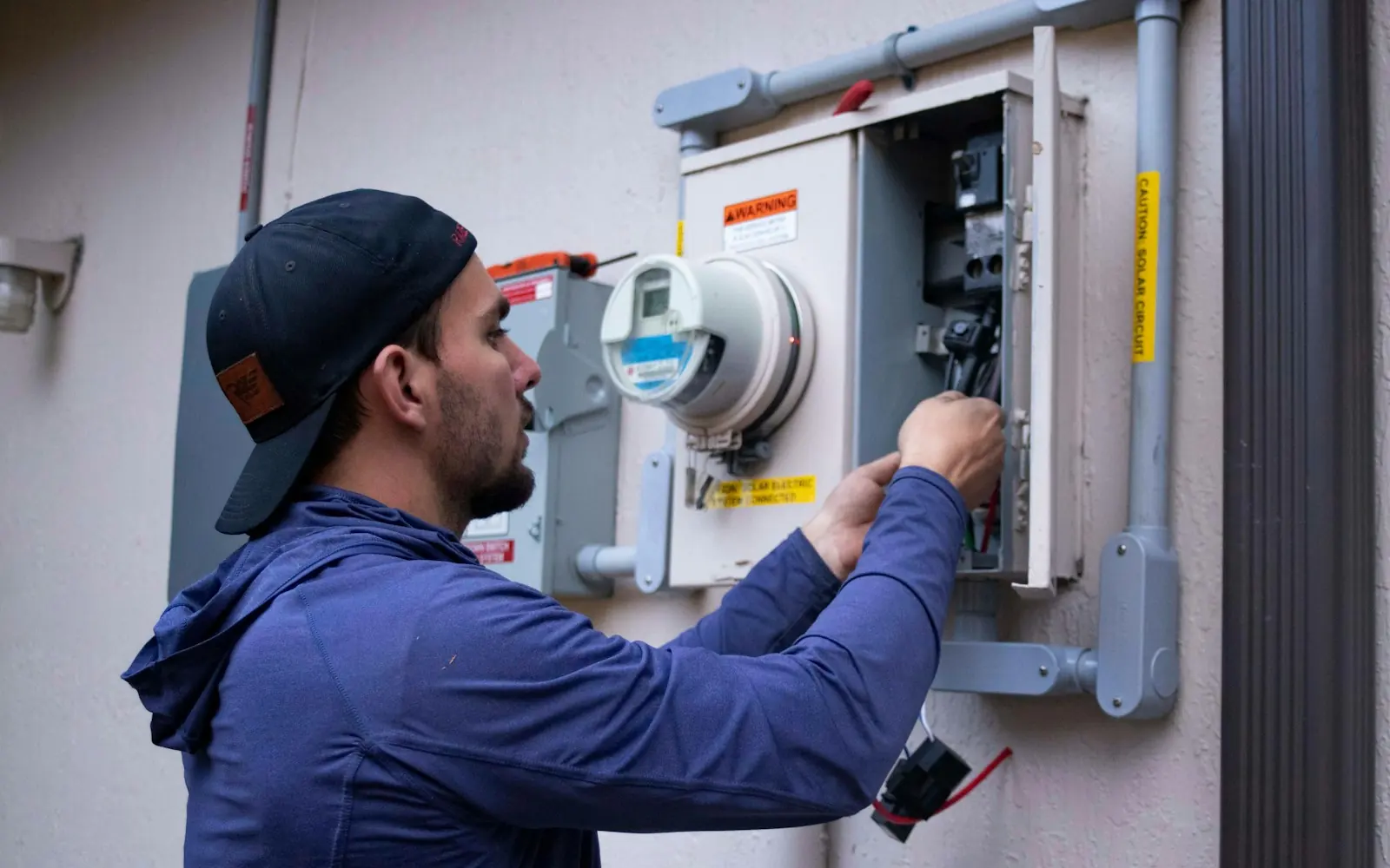 Technician working on an electrical meter