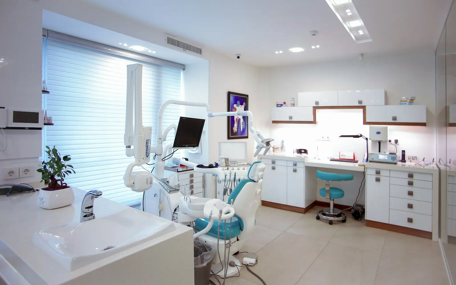 Modern dental office with a chair and equipment
