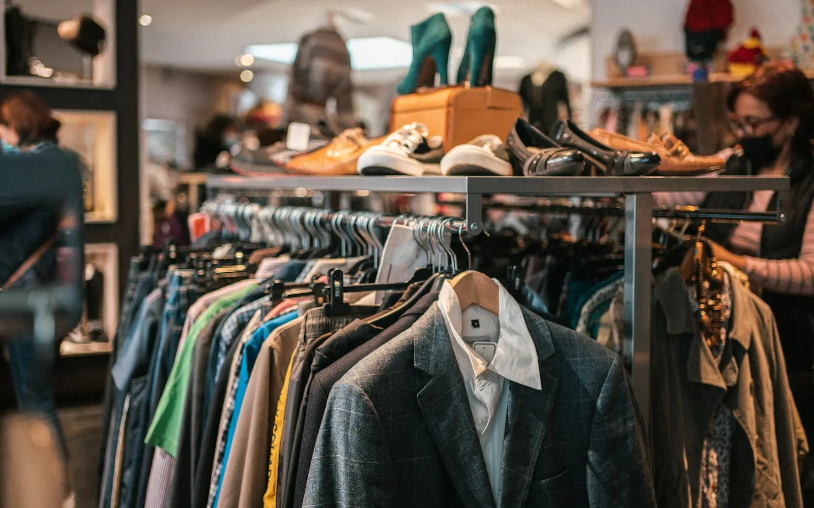 Rack of clothes and shoes in a shop
